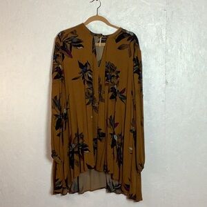 mustard yellow Free People babydoll dress with purple and blue floral pattern